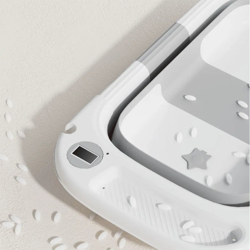 Travel-Ready Folding Baby Tub with Built-in Soft Support