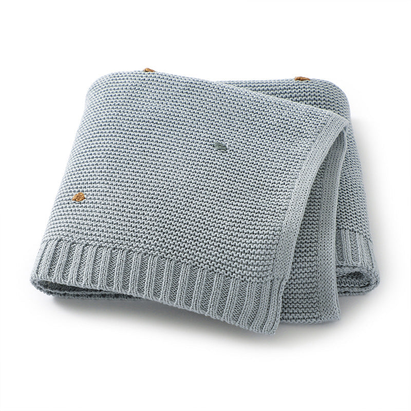 Knitted Solid Color Baby Blanket with Pom Poms