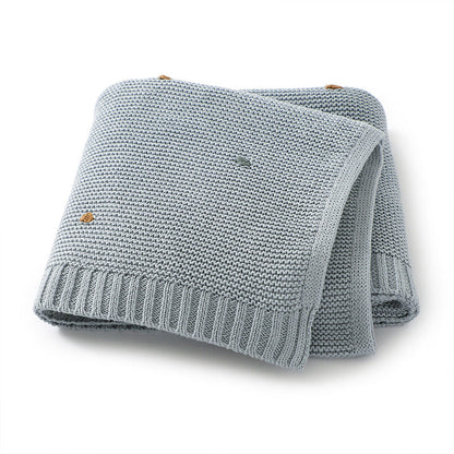 Knitted Solid Color Baby Blanket with Pom Poms