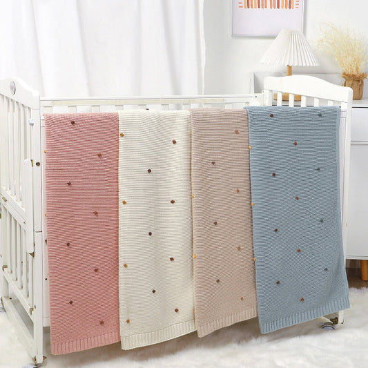 Knitted Solid Color Baby Blanket with Pom Poms